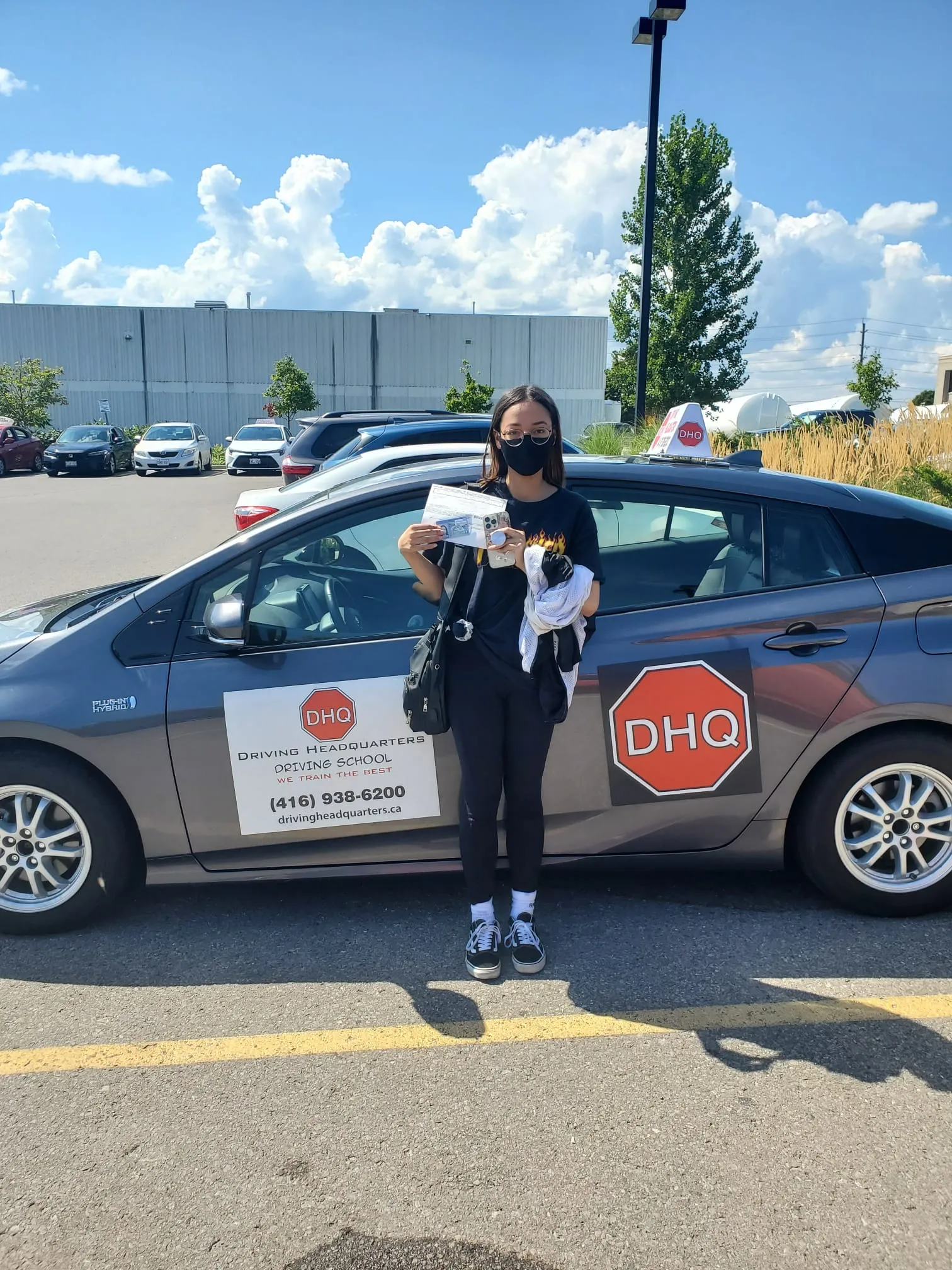 DHQ student with certificate